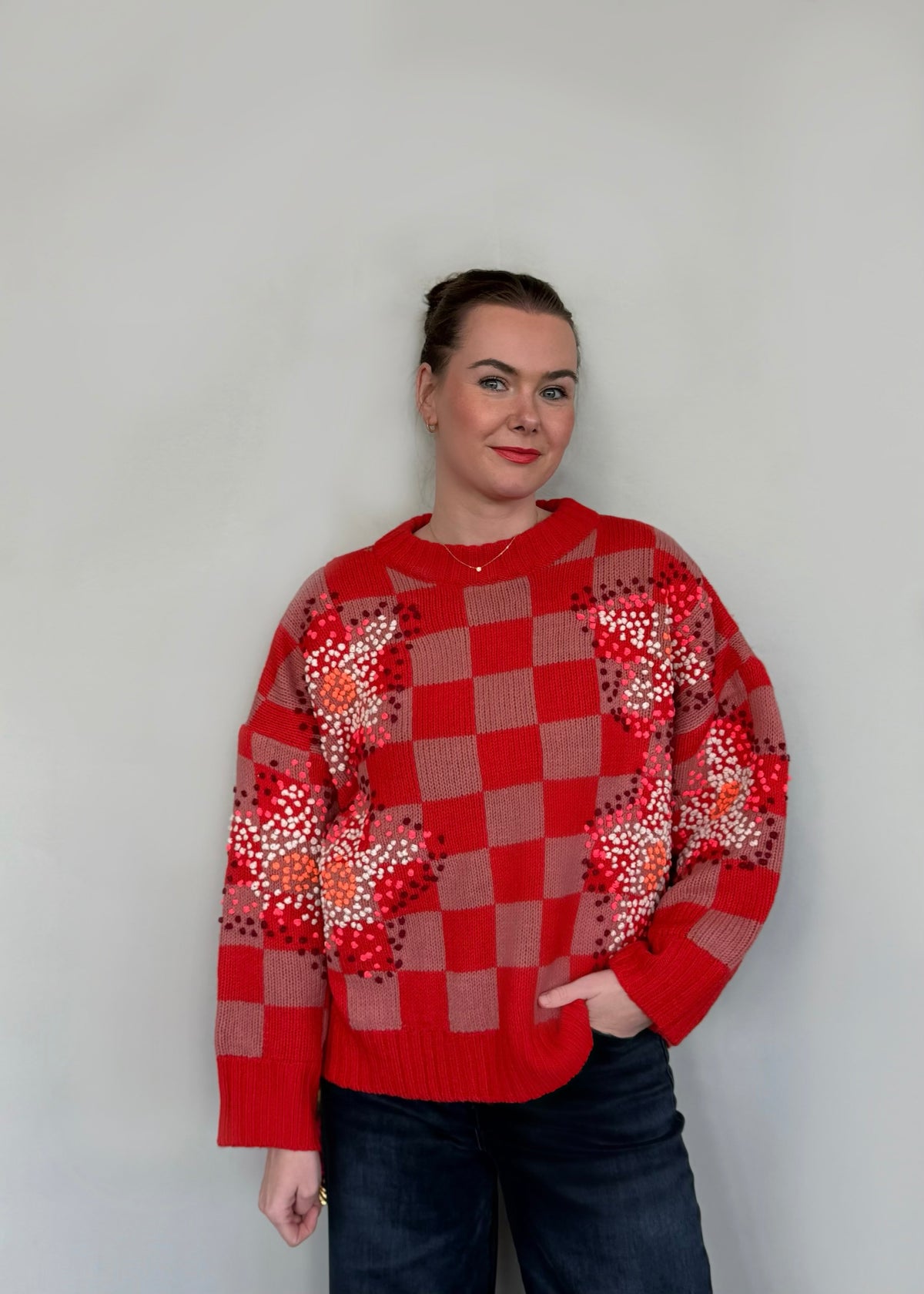 Pullover mit Schachbrettmuster