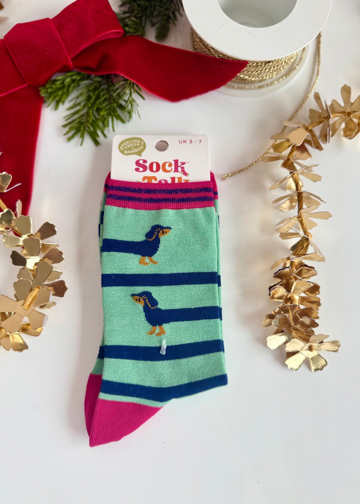 Socken 'lustiges Dackelmotiv' grün