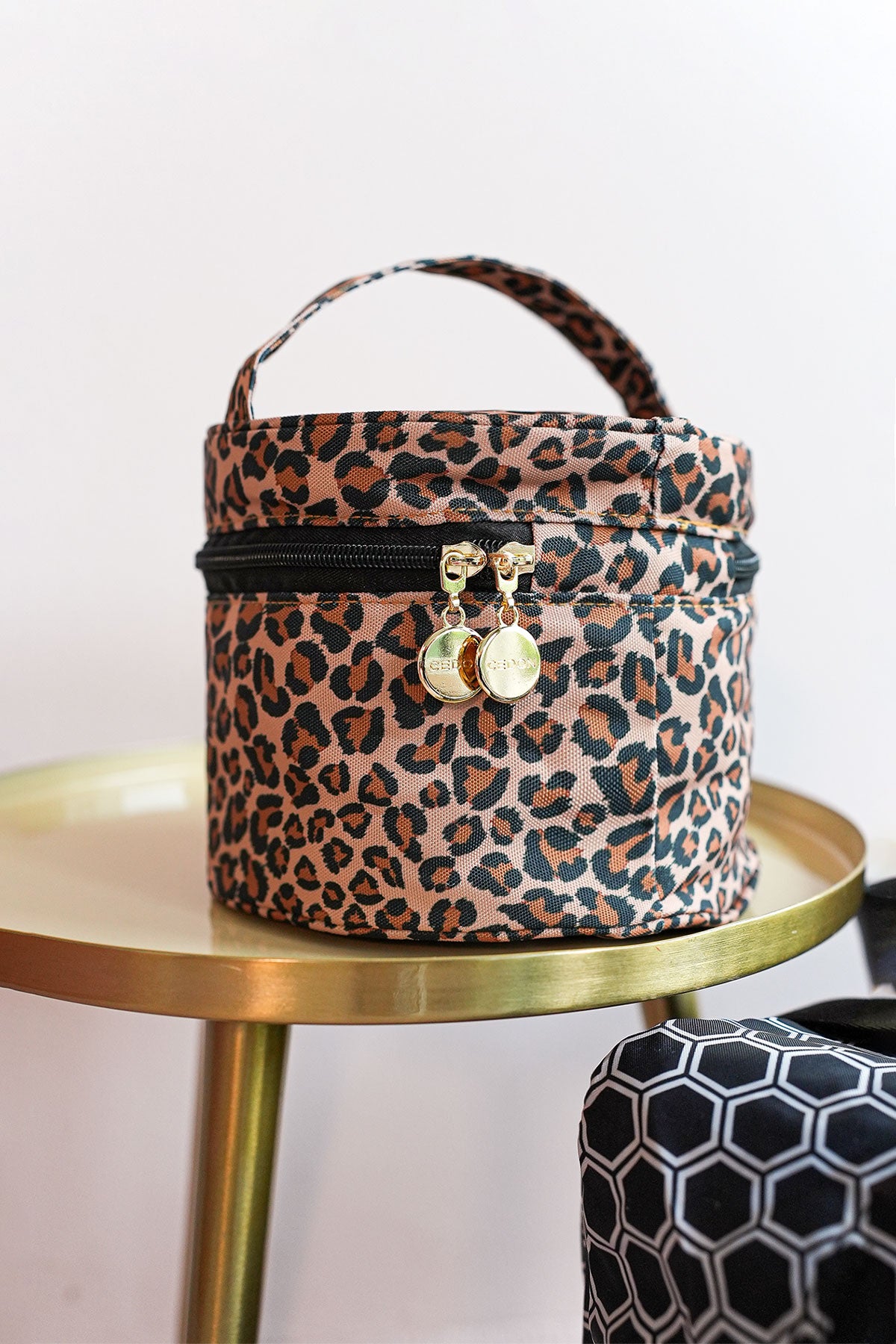 Kosmetiktasche rund Leo